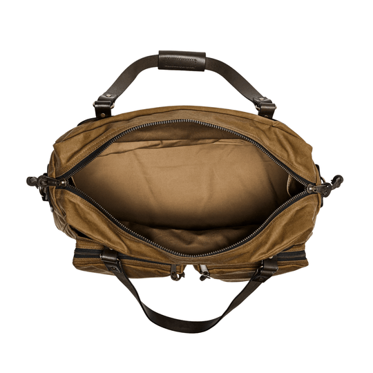 Brown canvas duffle bag with leather handles, open zippered top, and shoulder strap