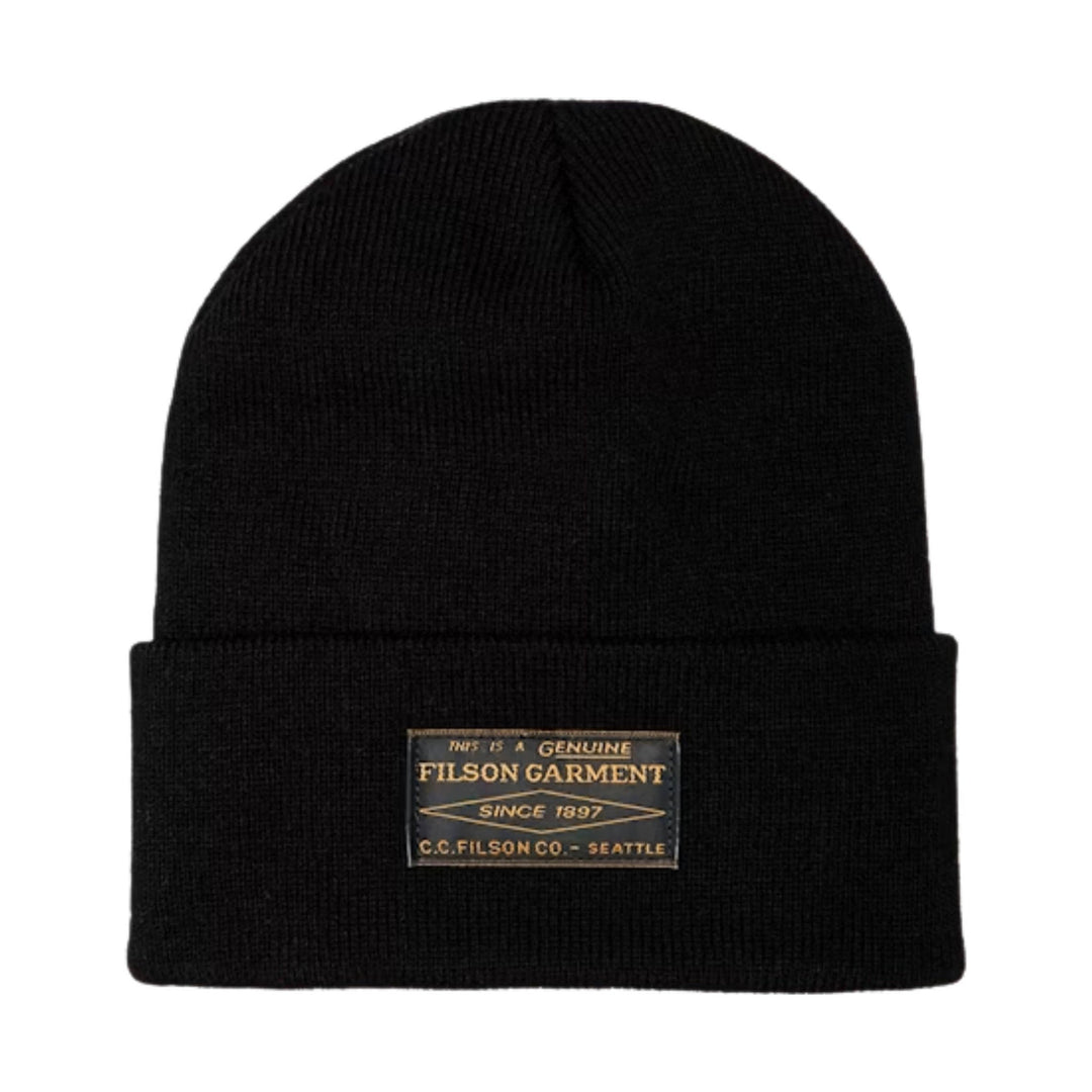 Black ribbed knit beanie with folded cuff and woven logo patch