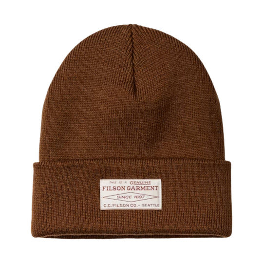 Brown ribbed knit beanie with folded cuff and front woven label