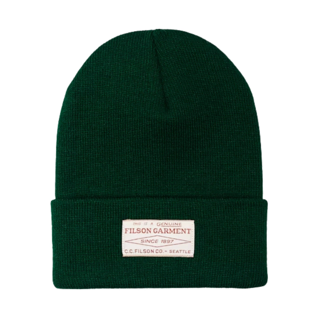 Dark green knit beanie with a folded cuff and front Filson label patch
