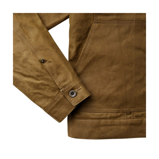 Brown canvas jacket sleeve and hem with snap cuff and stitched seams