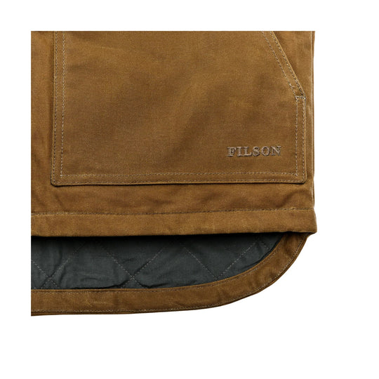 Brown work vest hem with quilted black lining and FILSON logo