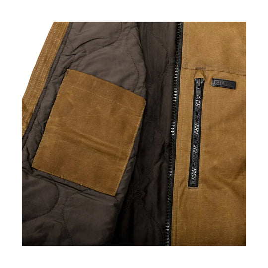 Brown suede jacket lining with quilted interior, front zipper, chest pocket, and visible FILSON patch