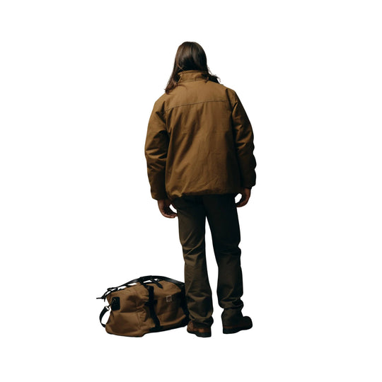Brown jacket and pants shown from the back beside a brown duffel bag on a white background