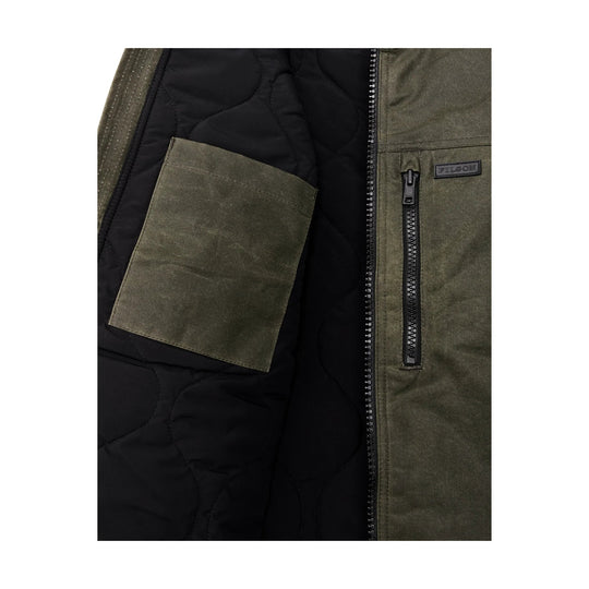Olive quilted vest lining with a front zip pocket and FILSON logo patch