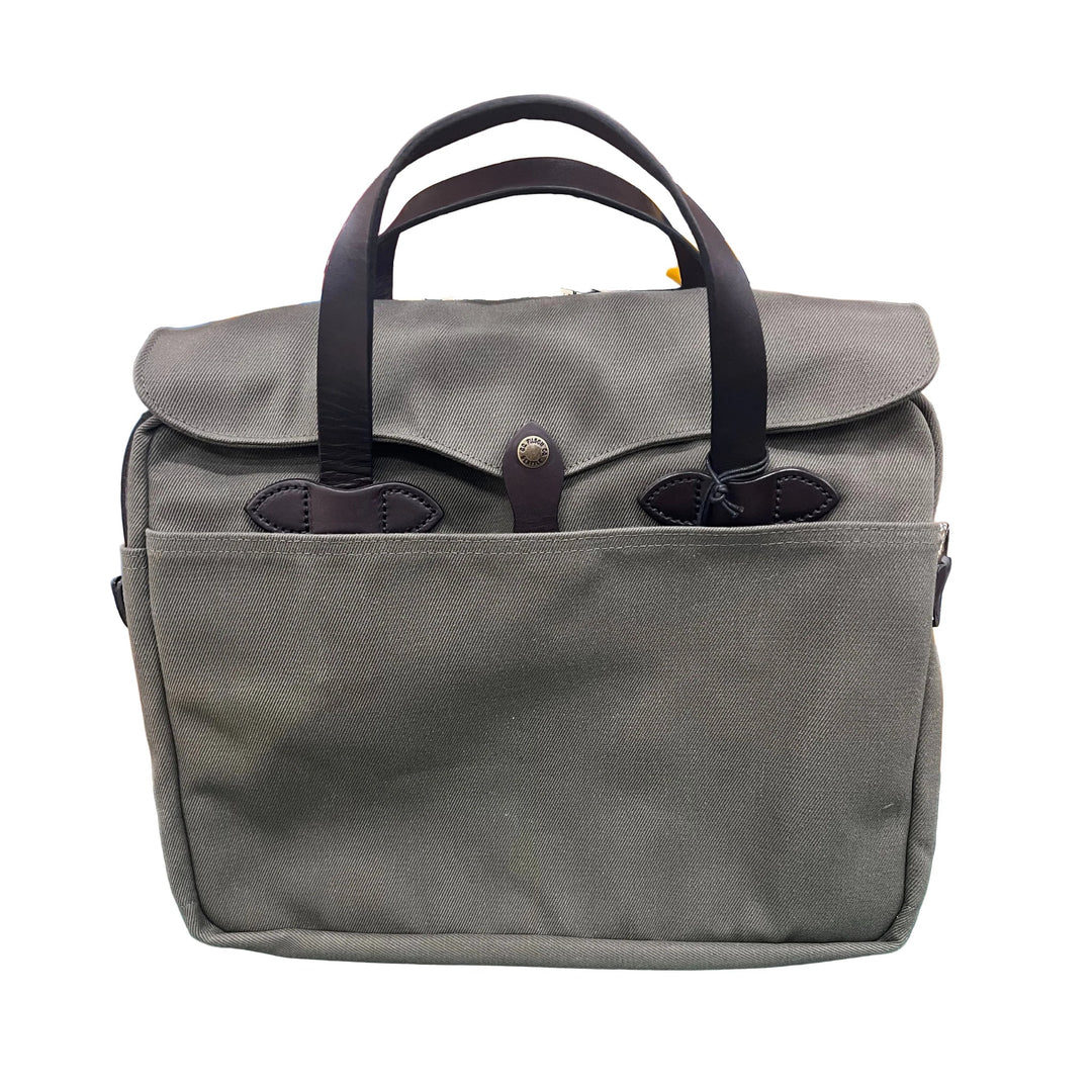 Gray canvas briefcase with black leather handles, front flap closure, and a large front pocket