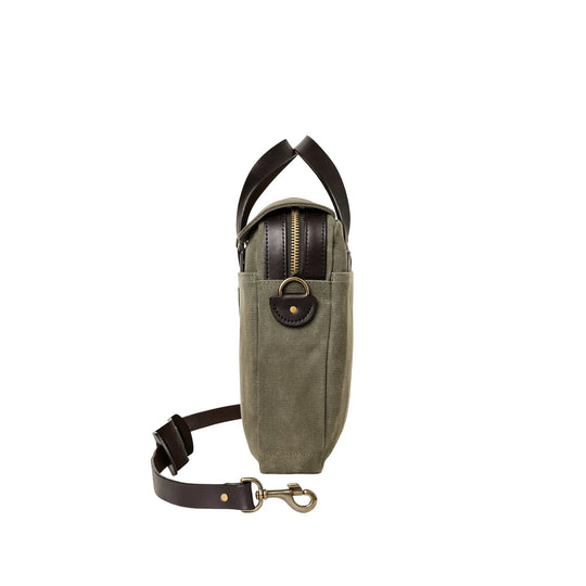 Olive canvas briefcase shown from the side with dark leather handles, trim, and shoulder strap