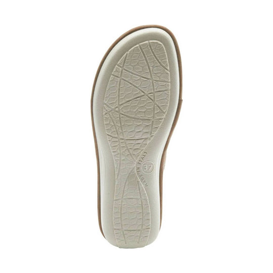 Beige flat sandal sole with textured tread and size 37 marking