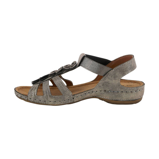 Metallic slingback sandal with cutout straps, flower decoration, and a low wedge sole