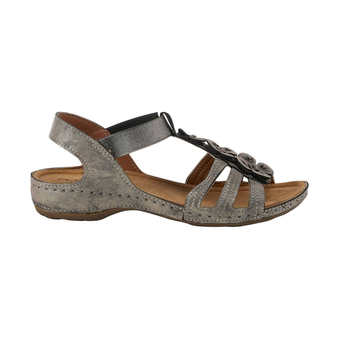 Metallic gray slingback sandal with cutout toe straps, flower detail, and low wedge sole