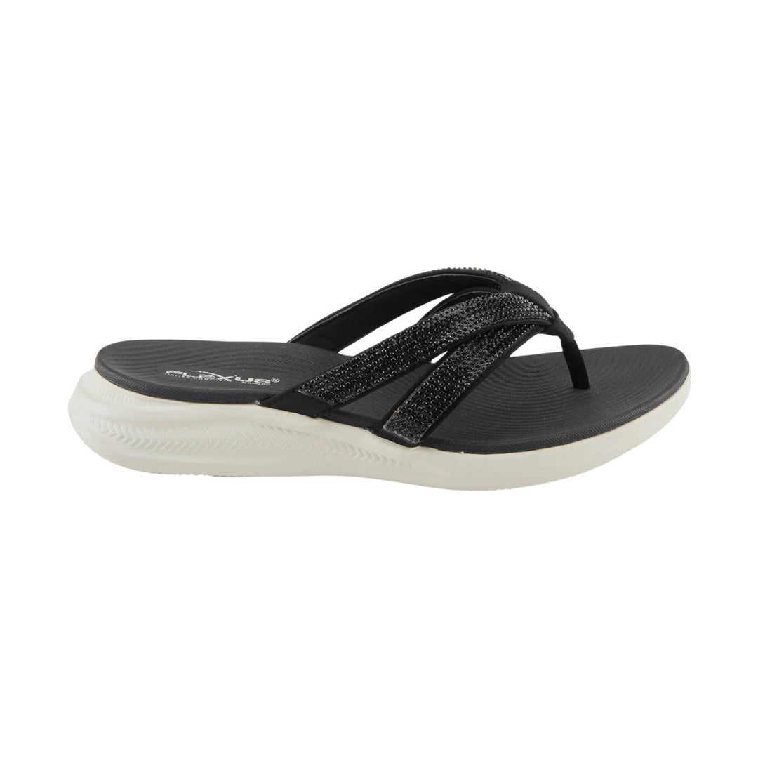 Black thong sandal with beaded crisscross straps and a white wedge sole