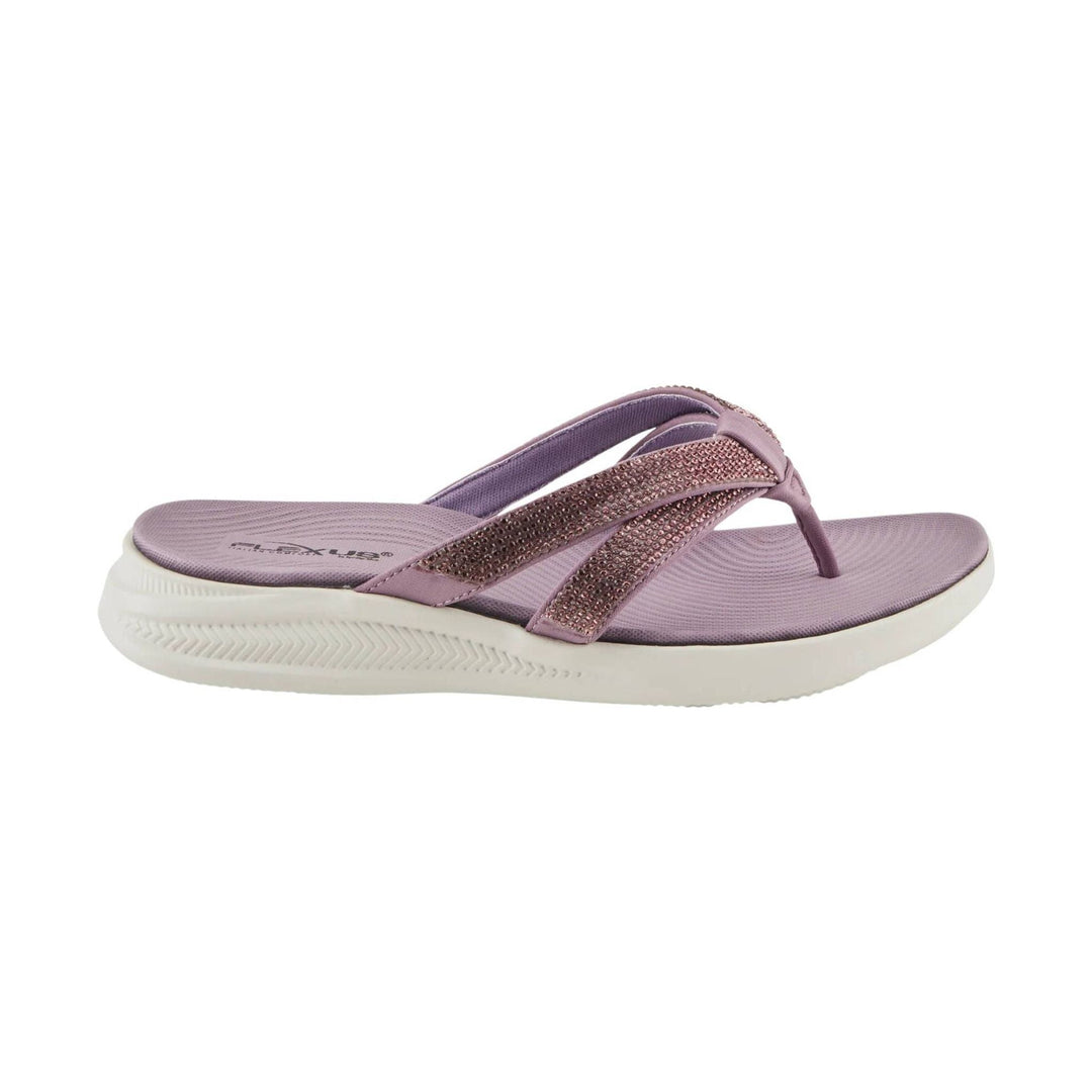 Lavender flip-flop sandal with rhinestone crisscross straps and a white cushioned sole