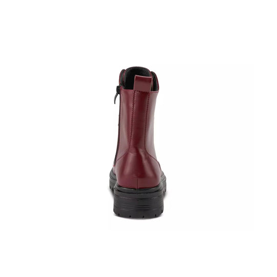 Burgundy mid-calf boot with black lug sole, rear zipper, and pull tab, shown from the back