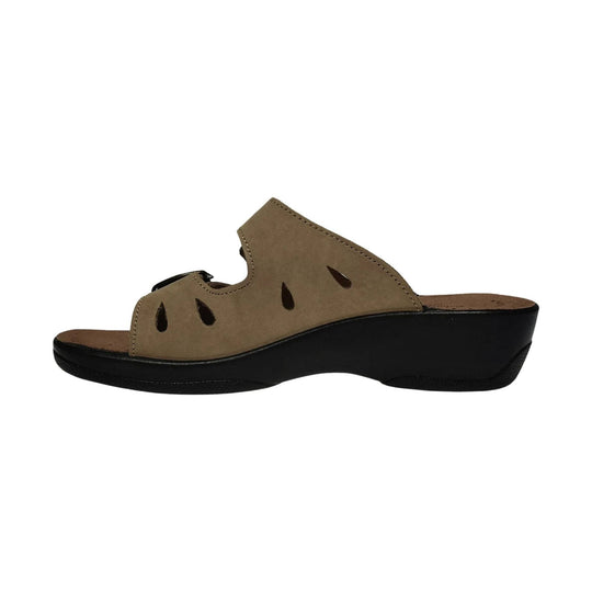Beige slide sandal with teardrop cutouts and a black wedge sole, side view