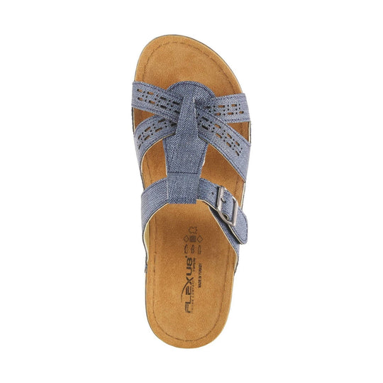 Blue denim cross-strap slide sandal with a buckle and tan footbed
