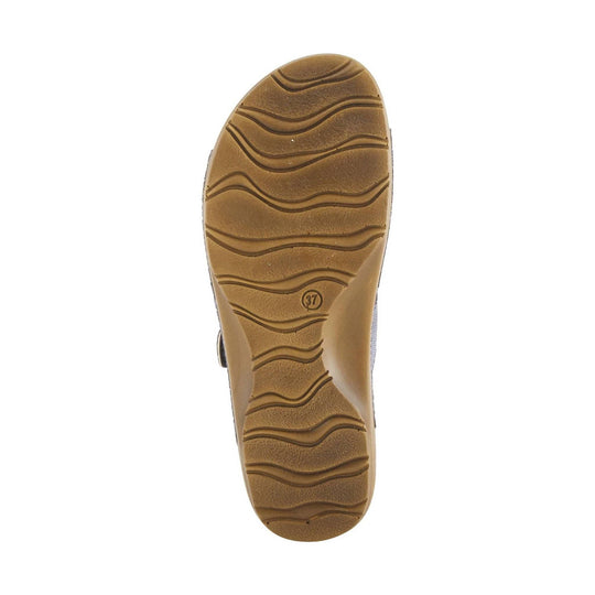 Tan shoe outsole with wavy tread pattern and size mark 37