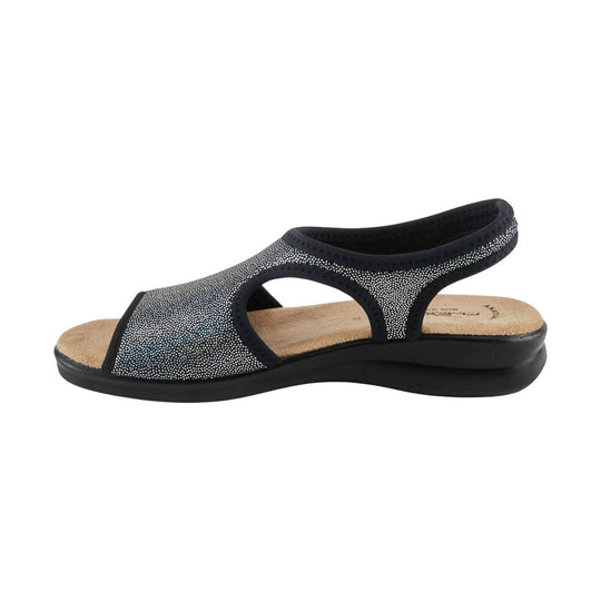 Black slip-on sandal with dotted upper, open side cutouts, and cushioned sole