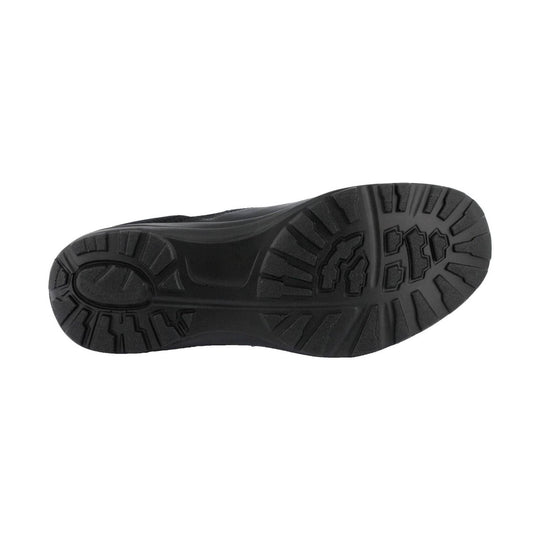Black shoe sole with deep traction lugs and molded tread patterns