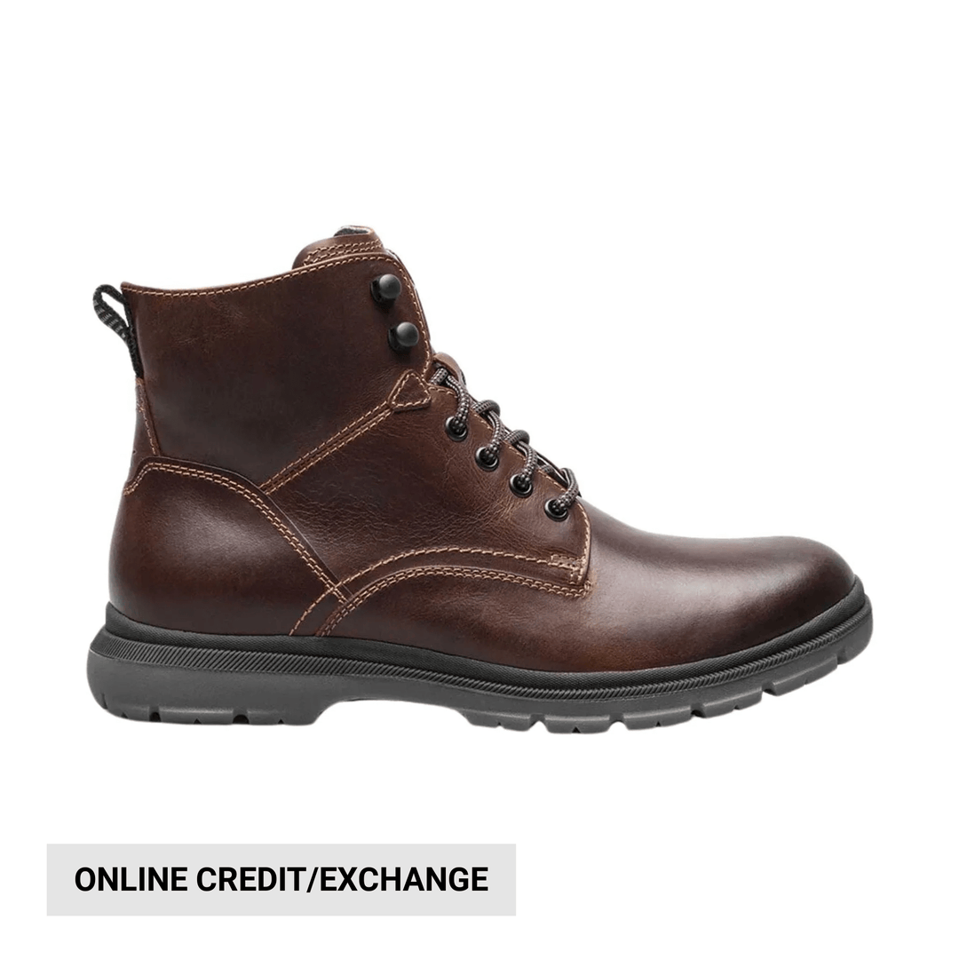 Brown leather lace-up ankle boot with black lug sole, shown in side view