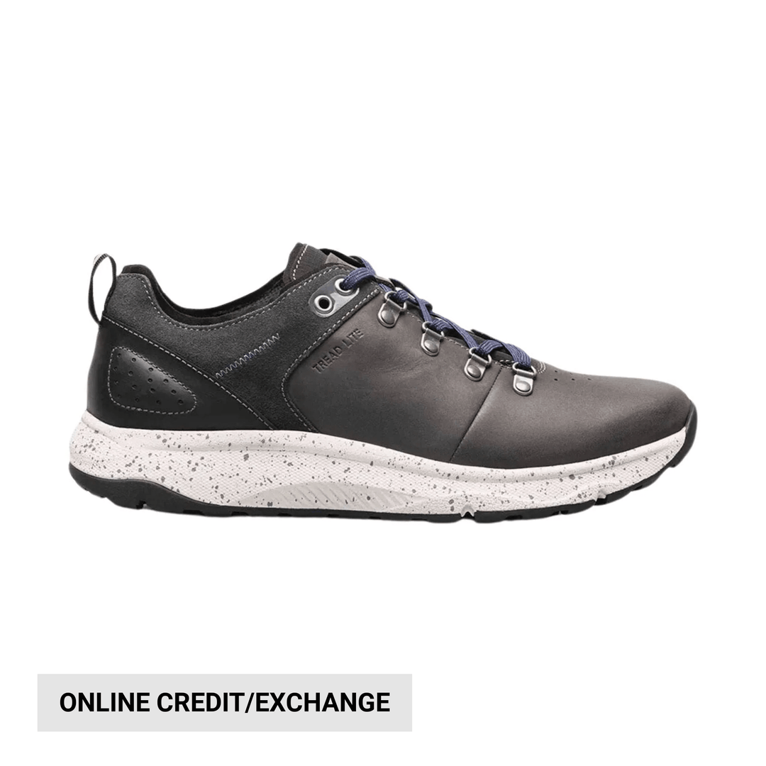Gray and black lace-up sneaker with speckled white sole, side view