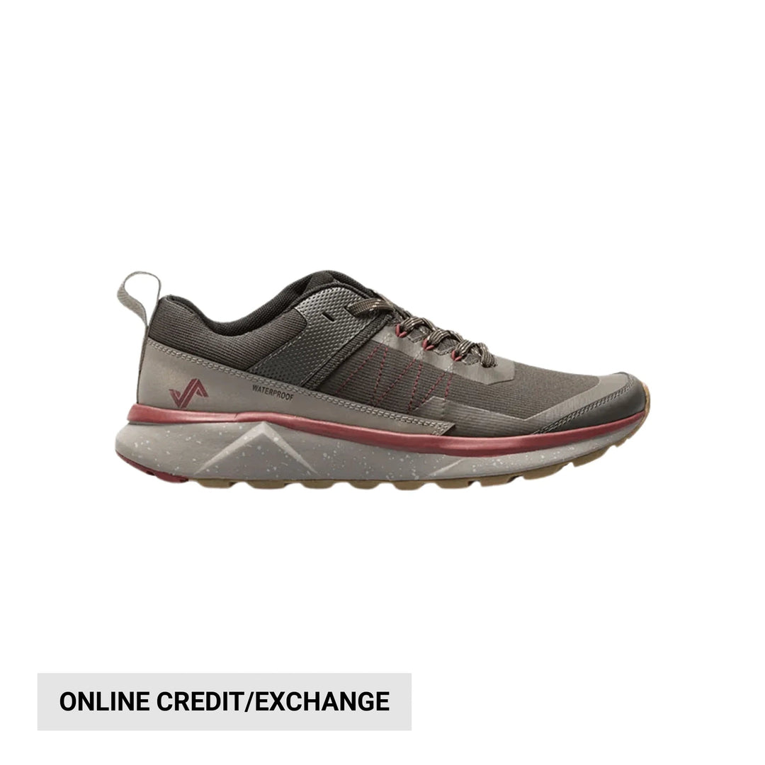 Gray low-top hiking shoe with black mesh panels, red accents, and a speckled white midsole