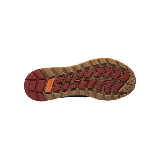 Tan and red hiking shoe outsole with aggressive tread
