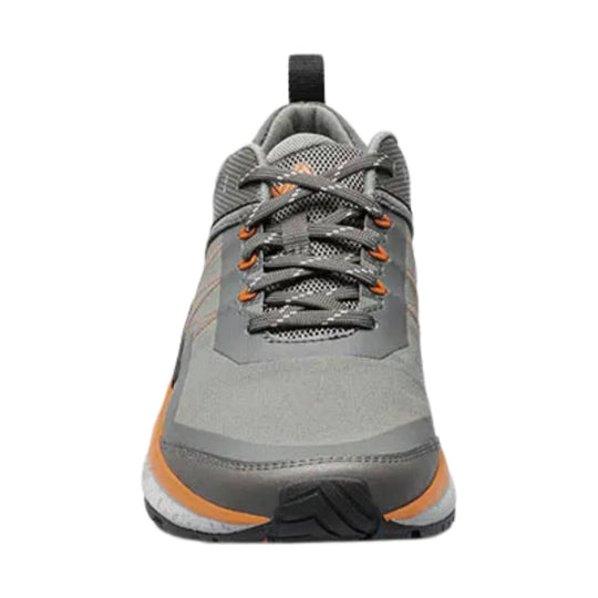 Gray low-top hiking shoe with orange accents, mesh panels, and black laces, shown from the front