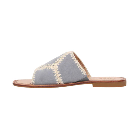Gray crochet slide sandal with cream stitched trim and a tan leather sole, shown in side view