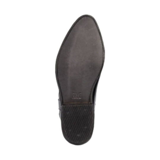 Black boot sole with a smooth arch and textured heel tread, shown from below