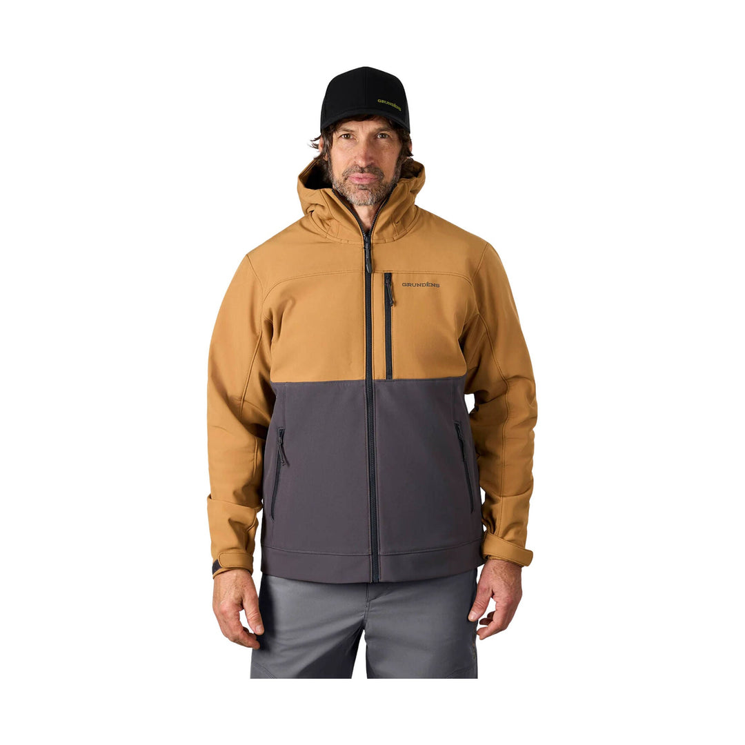 Tan and gray hooded zip-up jacket with chest and hand pockets, shown on a model wearing a black GRUNDENS cap