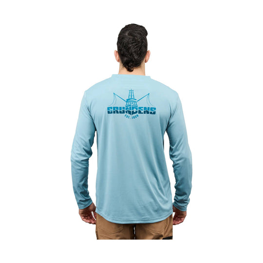 Light blue long-sleeve performance shirt shown from the back with a large GRUNDENS graphic on the upper back