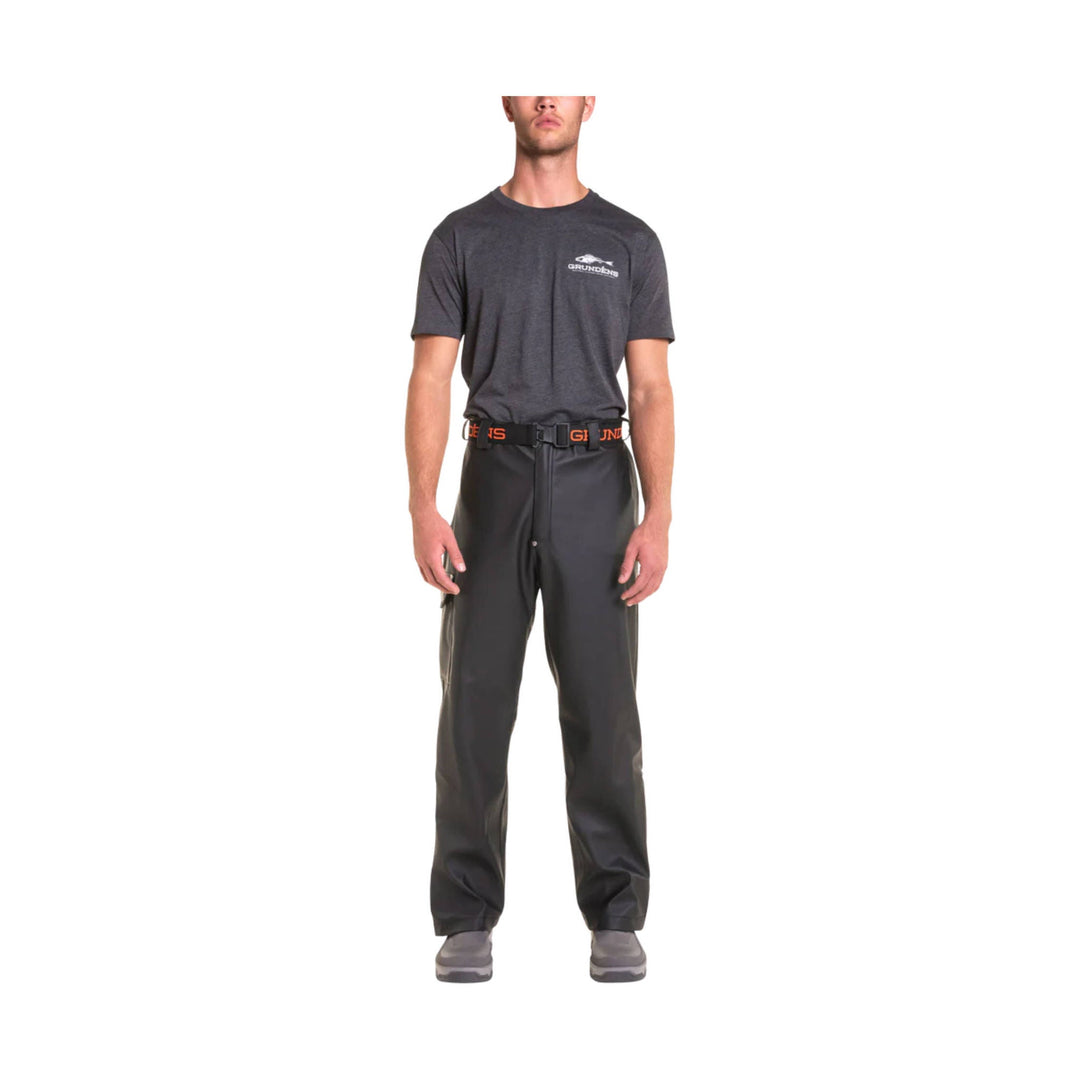 Black men's pants with a belt and straight-leg fit, shown with a dark T-shirt and gray shoes