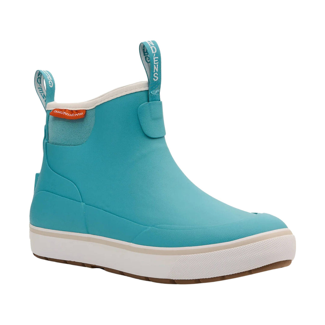 Turquoise ankle boot with pull tabs, white sole, and orange GRUNDENS tag