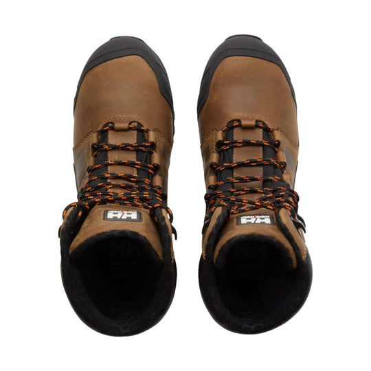 Brown and black tall winter work boots with orange-and-black laces, shown from above