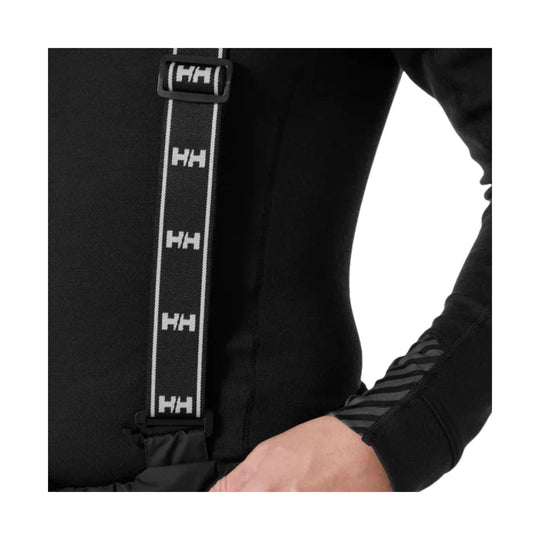 Black work pants with a branded suspender strap and ribbed side panel