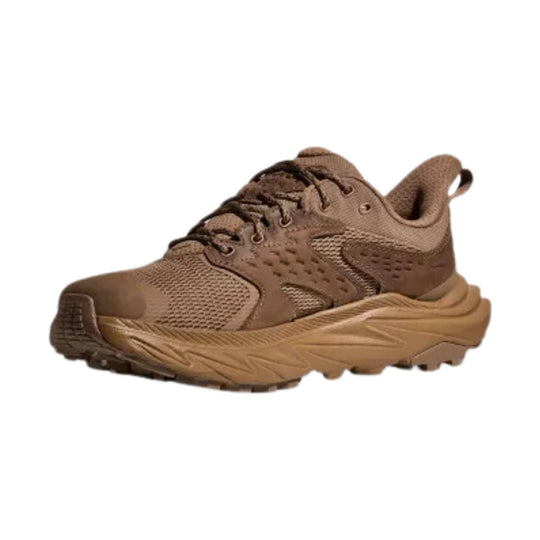 Brown low-top hiking shoe with mesh upper, lace-up closure, and thick lugged sole