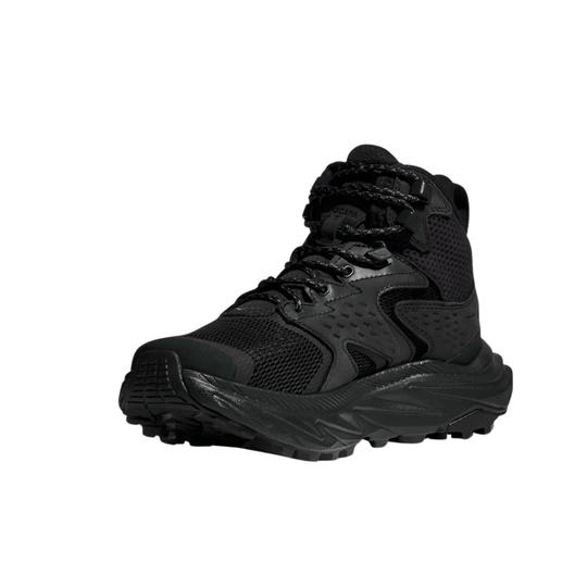 Black mid-top hiking boot with mesh upper, rugged treaded sole, and bungee laces