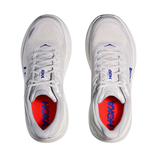 White running shoes with blue HOKA branding and red insoles, shown from above