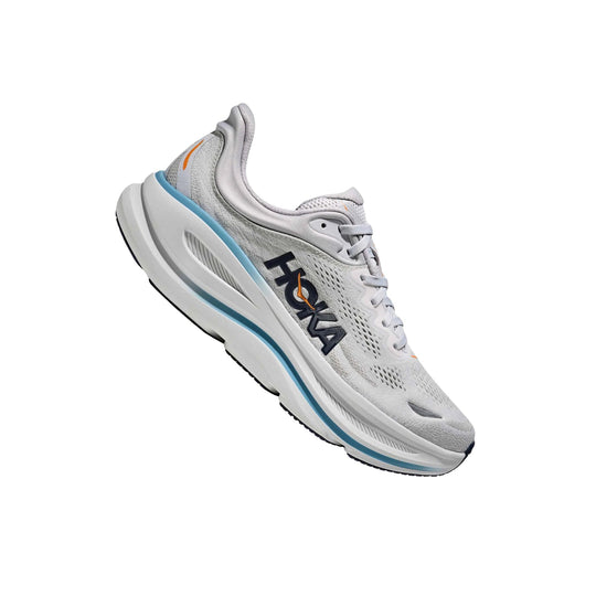 Light gray running shoe with navy HOKA branding, white sole, and blue accents