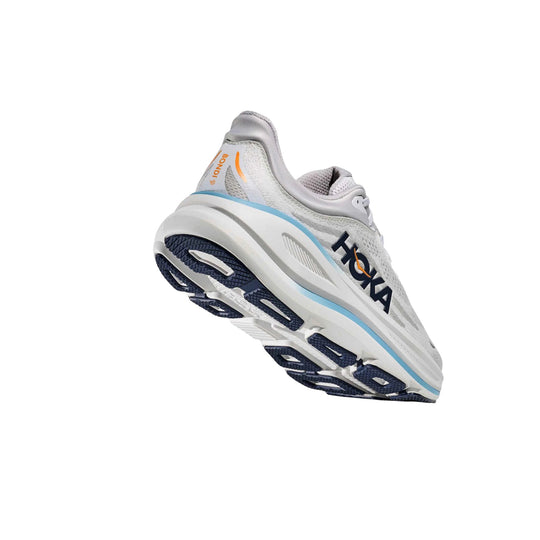 White and gray running shoe with navy outsole and blue accent stripe, shown from the side and sole