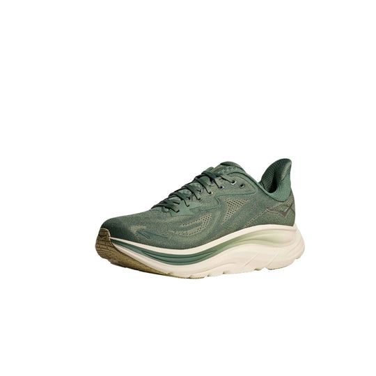 Green running shoe with thick white foam sole and brown outsole, shown in side view