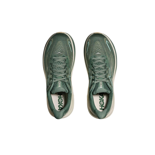 Pair of olive green running shoes with white midsoles, shown from above