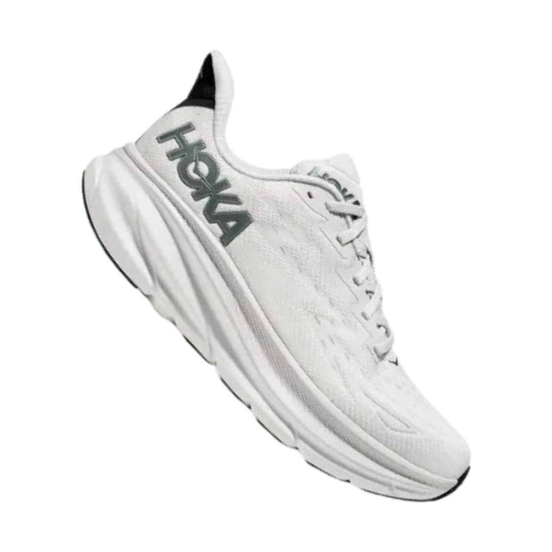 Light gray running shoe with a thick white cushioned sole and black accents