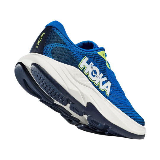 Blue and navy running shoe with white midsole and black outsole, shown from the side