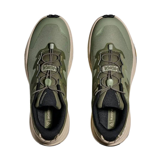 Pair of olive green trail shoes with bungee laces, black collars, and beige soles