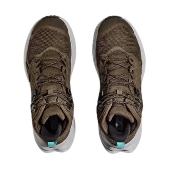 Brown mid-top hiking shoes with mesh uppers, white soles, and teal heel tabs