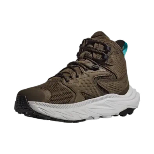 Brown mid-top hiking boot with black toe cap, white outsole, and teal heel pull tab
