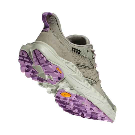 Light gray hiking shoe with purple lug outsole and visible GORE-TEX tag