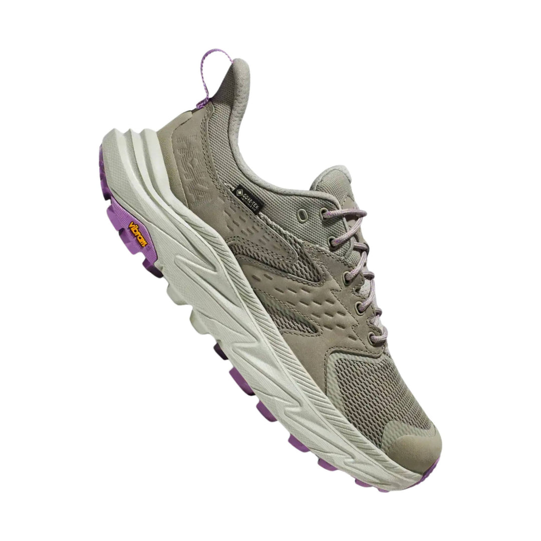 Gray low-top hiking shoe with mesh panels, purple outsole accents, and GORE-TEX and Vibram branding