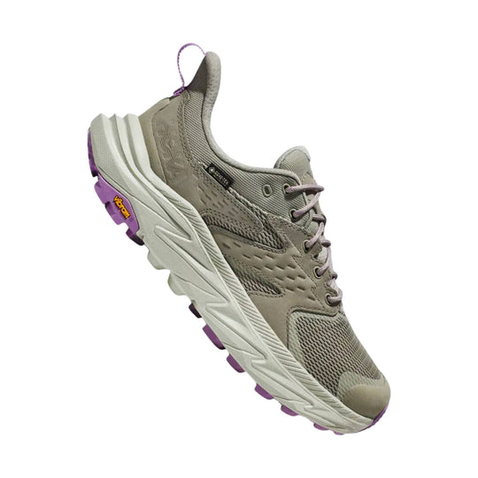 Gray low-top hiking shoe with mesh panels, purple outsole accents, and GORE-TEX and Vibram branding